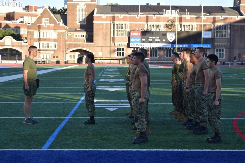 Battalion Commanding Officer, Midshipman Conway, addresses Kilo Company Commander, Midshipman Mole.