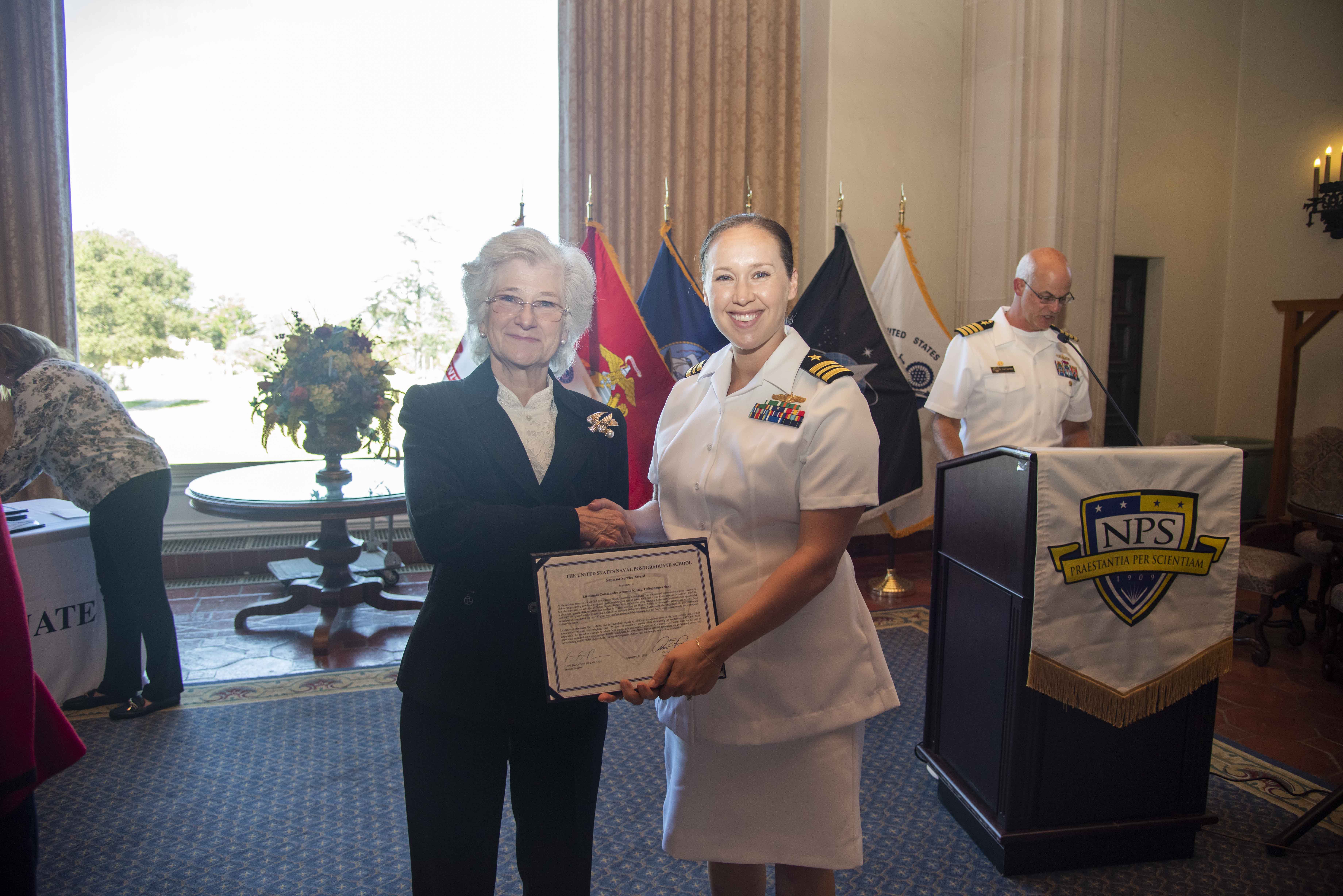 Receiving the award from NPS President VADM Rondeau -- September 2022
